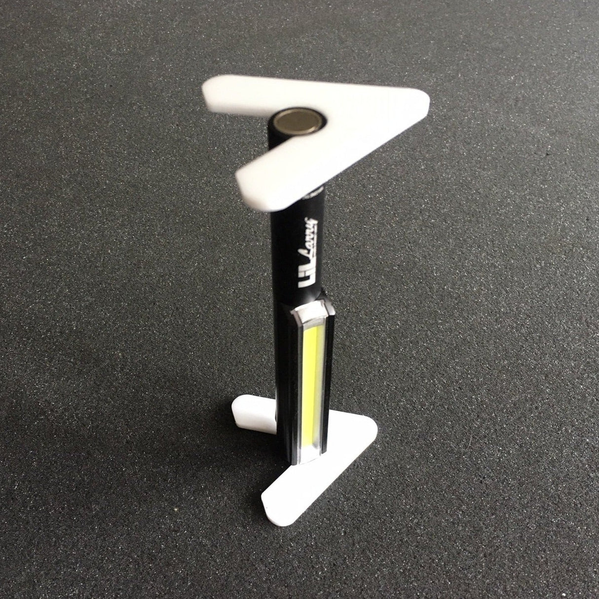 Lil Larry Pocket Light with Grandwork Legs used vertically, light at bottom.ally.