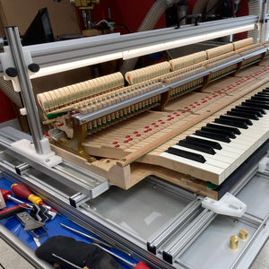 Full Monte—includes a Custom Keybed with electric base, comprehensive regulation tools, and hammer hanging tools