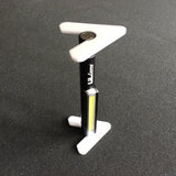 Lil Larry Pocket Light with Grandwork Legs used vertically, light at bottom.ally.