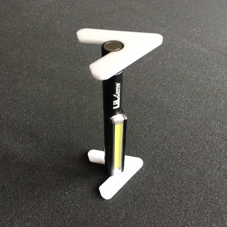 Lil Larry Pocket Light with Grandwork Legs used vertically, light at bottom.ally.